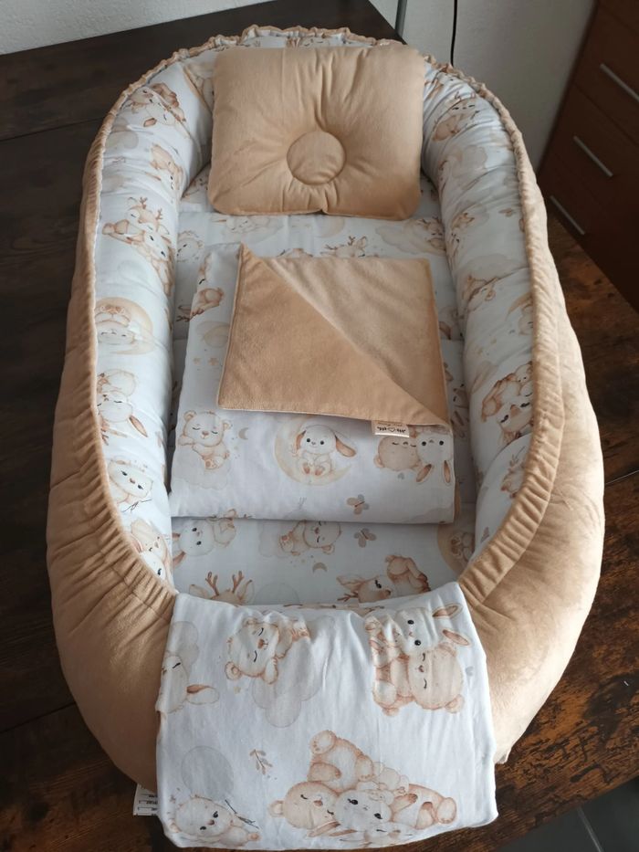 Réducteur lit bébé