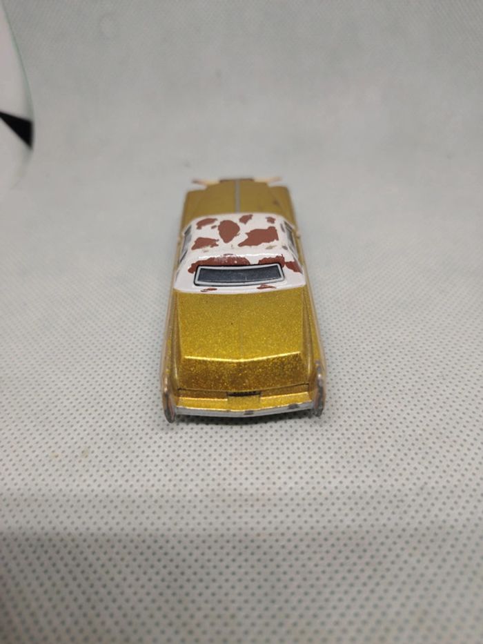 Voiture cars disney metal tex dinoco yeux lenticulaires bon état - photo numéro 6