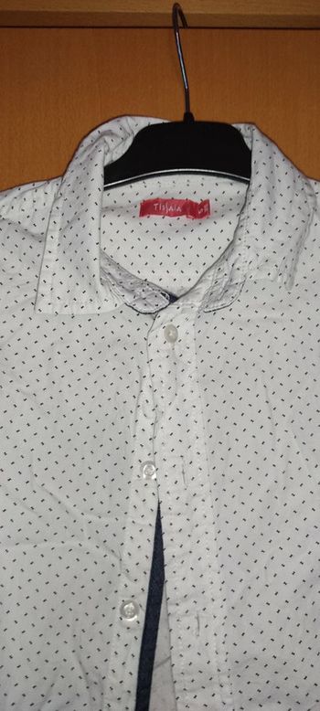 Chemise blanc cassé motif petit noeud papillon comme neuve