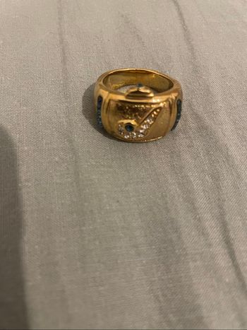 Bague fantaisie dorée – strass & pierre bleue