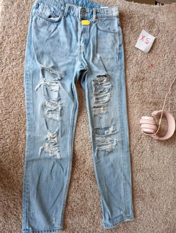 Jean troué taille Xs