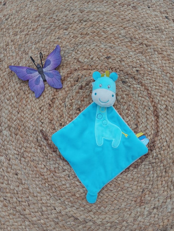 Doudou girafe neuf