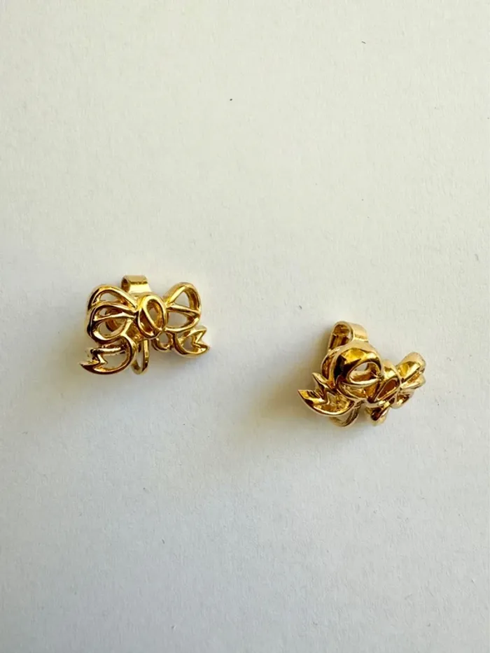 Boucles d’oreilles dorees a clip Nina Ricci - photo numéro 2
