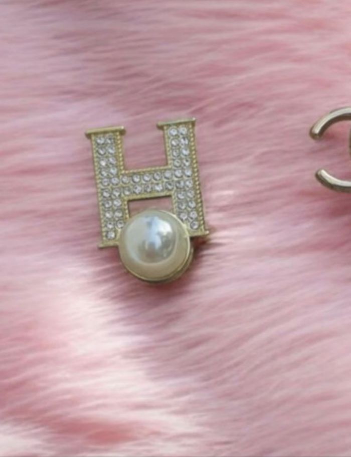 Broche Hermes H perle diamant