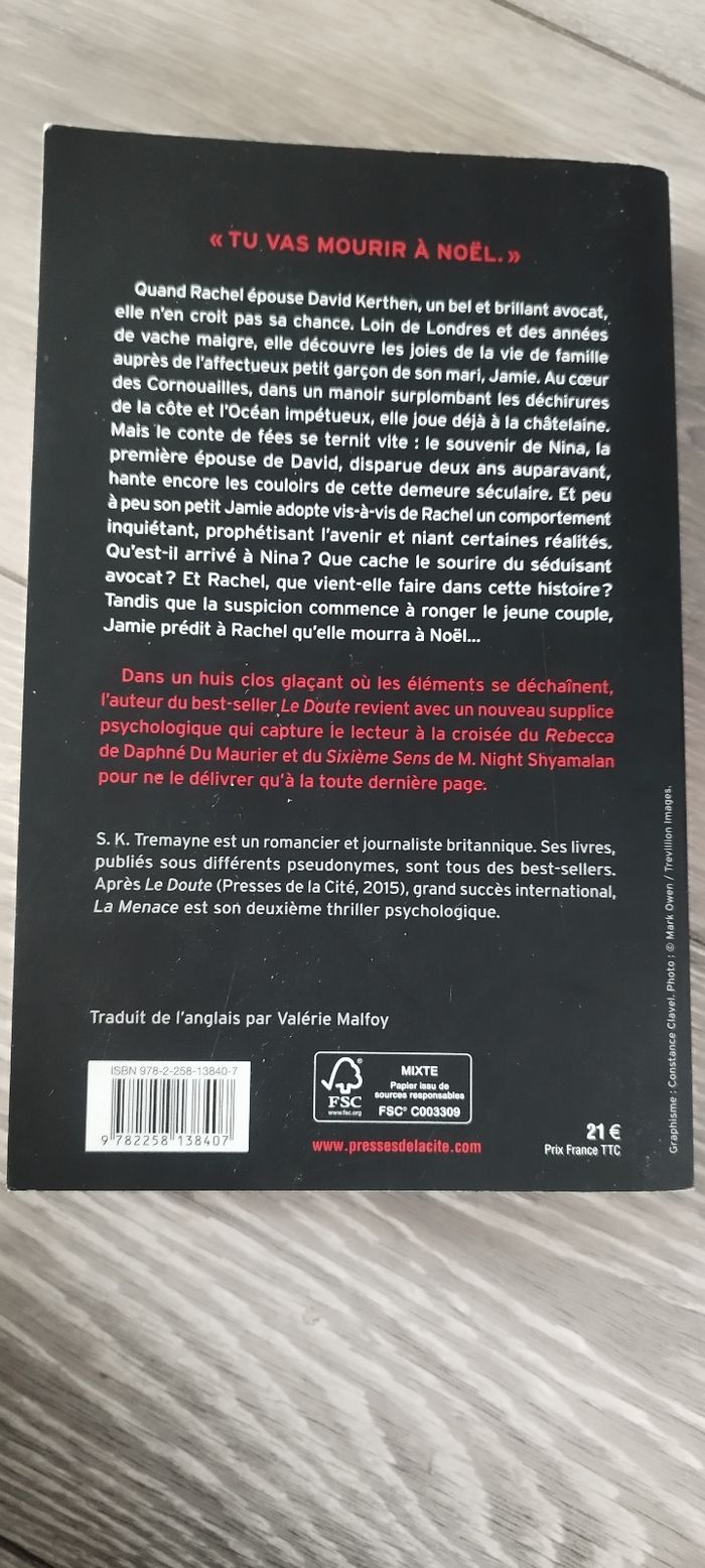 Livre la menace - photo numéro 2