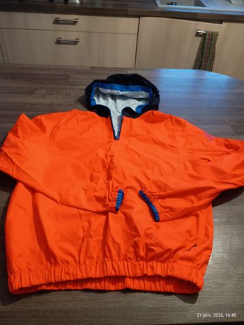 Veste de pluie t. 14 ans