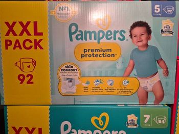 Couches pampers prenium protection taille 5, 92 couches.