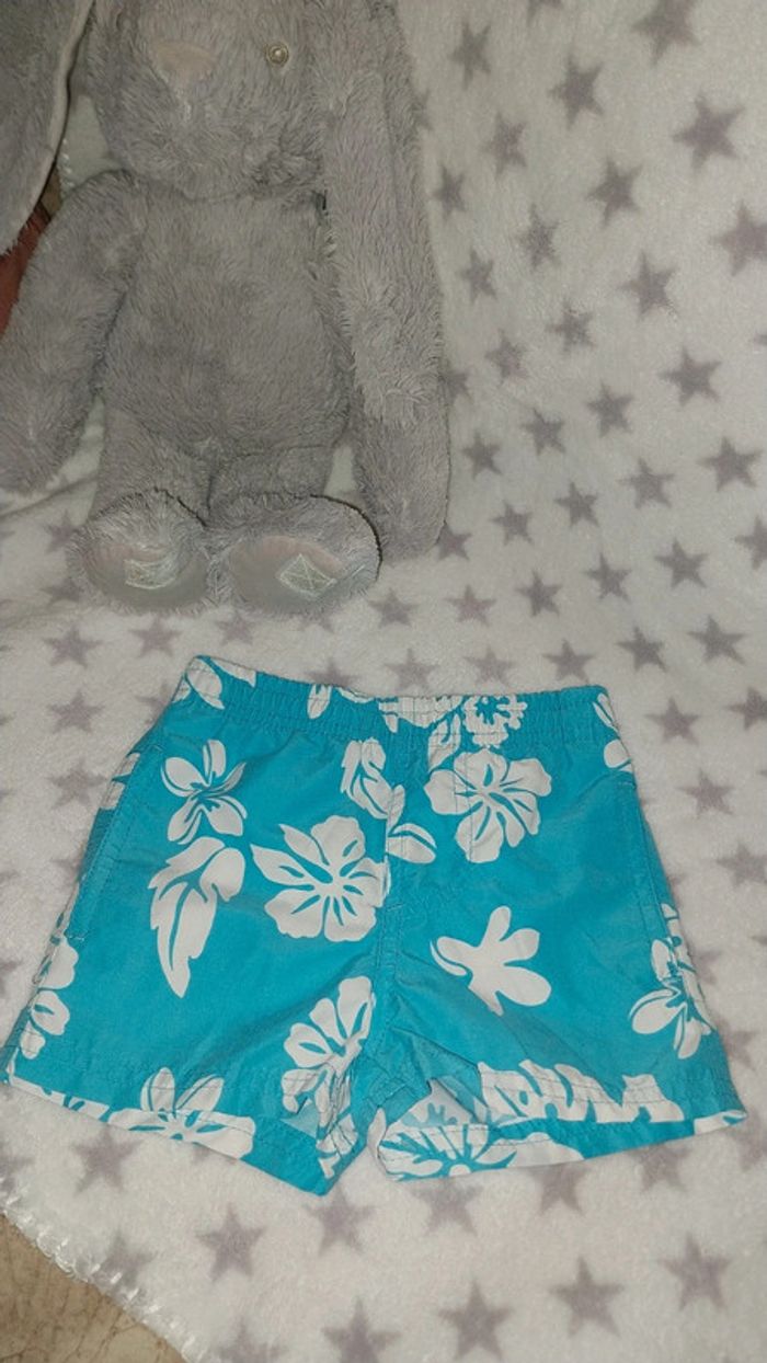 Short de bain bleu turquoise imprimé fleurs état neuf Taille 12 mois - photo numéro 2