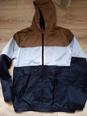 Coupe -vent marron et noir marque Gémo taille 14 ans
