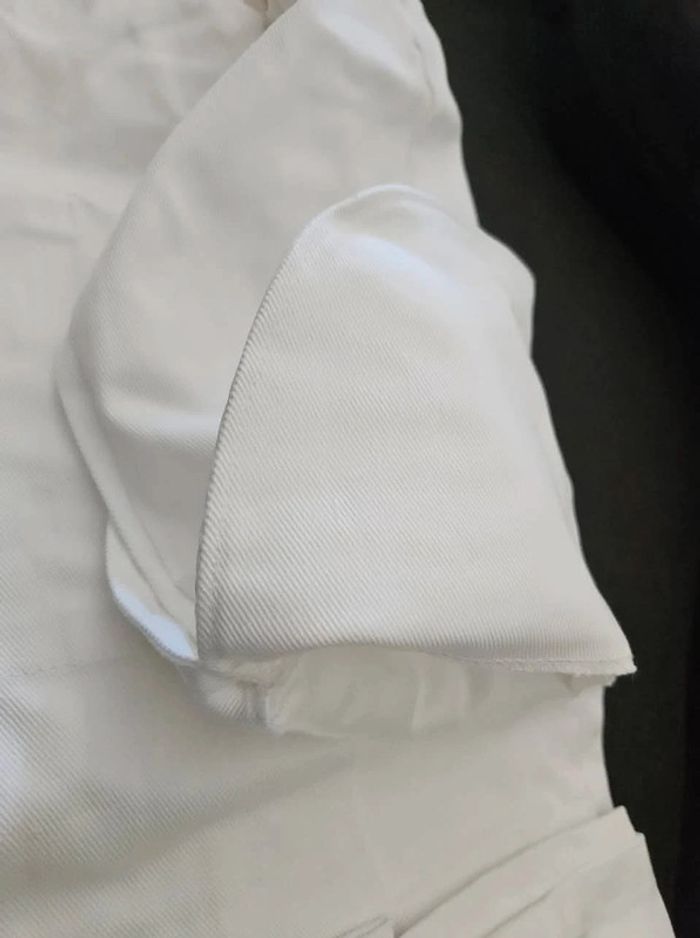 Veste de cuisinier
Bragard.
Taille : 44
Neuve - photo numéro 6