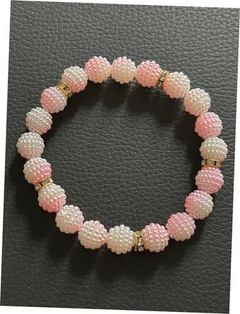 Bracelet rose clair blanc et doré en perles taille unique jamais porté