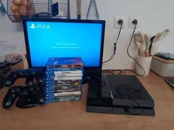 PlayStation 4 avec câbles 2 manettes officielles support  12 jeux