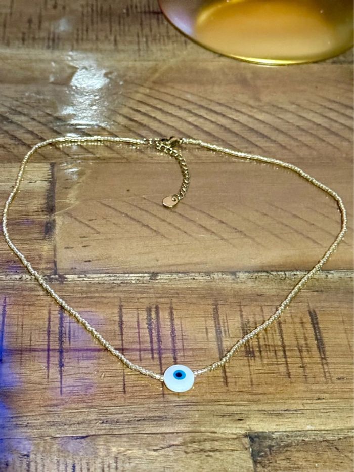 Collier réglable perles dorées œil bleu finition s acier inoxydable or - photo numéro 4