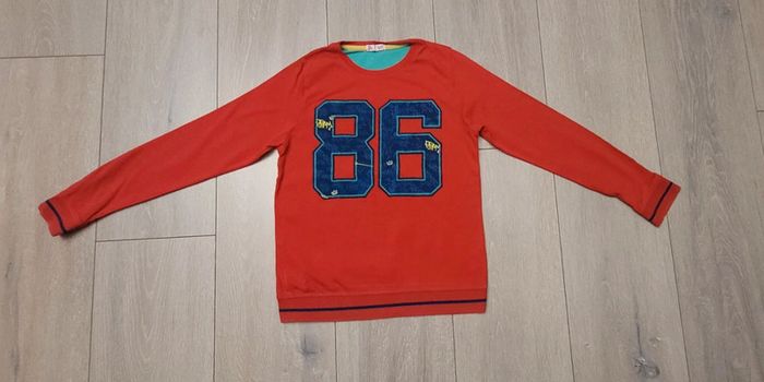 Maillot manche longue rouge. Garçon 8 ans. Marque Dp..am