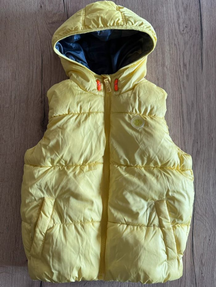 Doudoune sans manches esprit taille 6-7 ans comme neuve