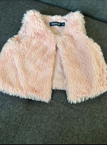 Vend veste sans manche moumoute