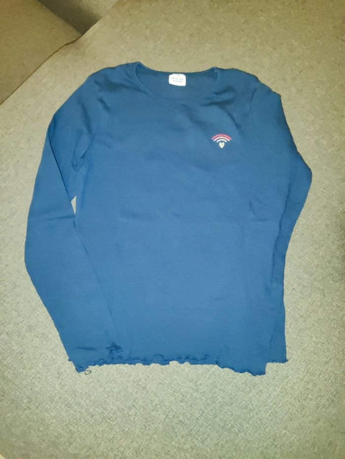 Haut bleu marine tape à l'oeil 12 ans