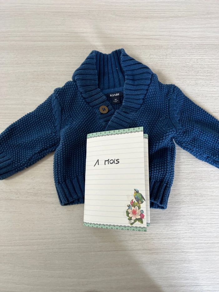 Gilet bleu Kiabi 1 mois