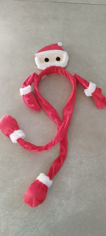 Serre tête de Noël bras qui bouge