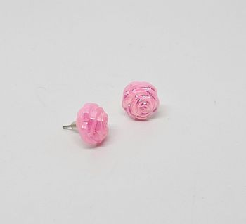 Paire de boucles d'oreilles.
Neuve.
Fleur rose