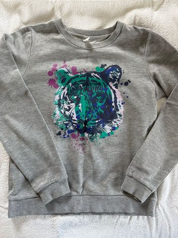 Pull sweet avec tête de lion taille 38 / M kiabi