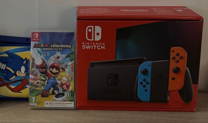 Nintendo switch 1 + 1 jeu + housse de transport