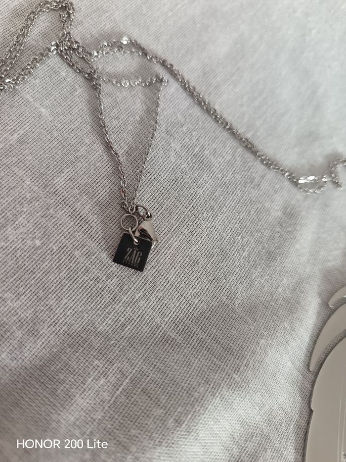 Collier plume argenté - photo numéro 4