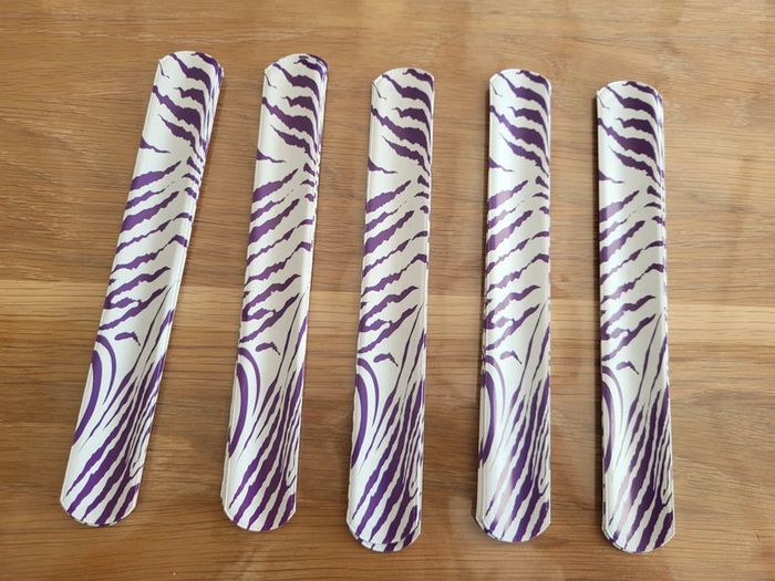 Lot de 17 bracelets clap