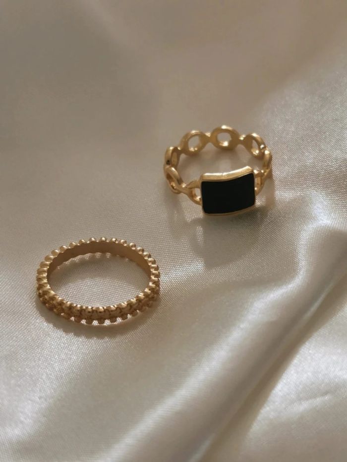 Lot de 2 bagues dorés taille 54