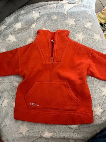 Pull col camionneur orange