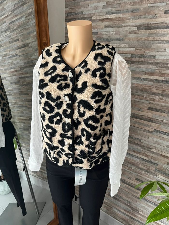 Veste sans manche moumoute