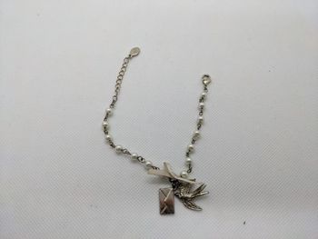 Bracelet perle, nœud, oiseau, enveloppe