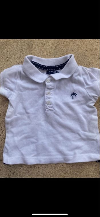 Polo kiabi bleu marine et blanc