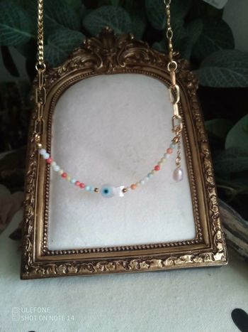 Collier nacre et poisson