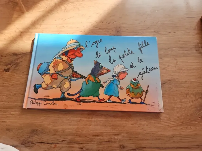 Livre l'ogre, le loup ,la petite fille et le gâteau