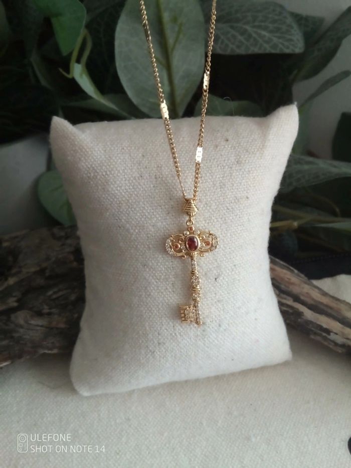 Collier clé acier inoxydable plaqué doré