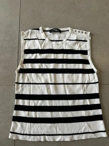 Haut sans manches Caroll, très bon état , taille 44