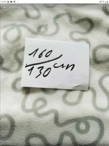 Plaid  gris blanc taille 160 /130 cm très bon état