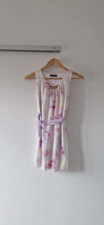 Robe violette et blanche taille 10ans 