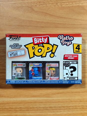 Bitty Pop! Retro Toys - Pack de 4 Figurines (Mr. Monopoly, Barrel Of Monkeys, Stretch Armstrong + Mystery)