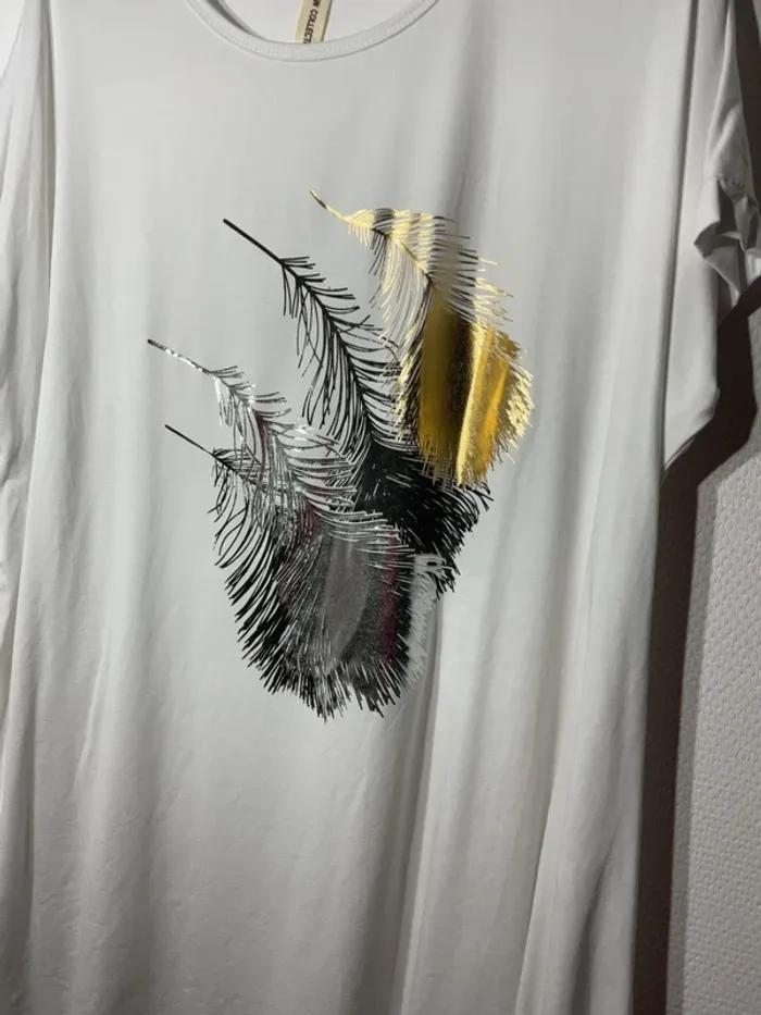 Tunique « plumes » femme taille unique(38-46)- rzfashion - neuf avec étiquette - photo numéro 2