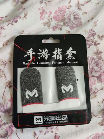 Mobile gaming finger sleeve
