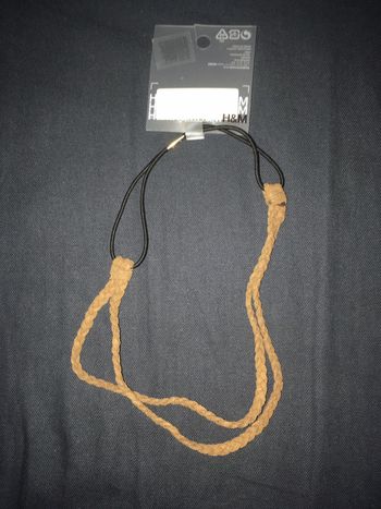 Bandeau de cheveux tressé brun