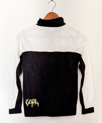 Veste de survêtement blanche et noire  neuve 10-12 ans