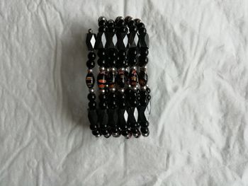 Bracelet/collier aimanté