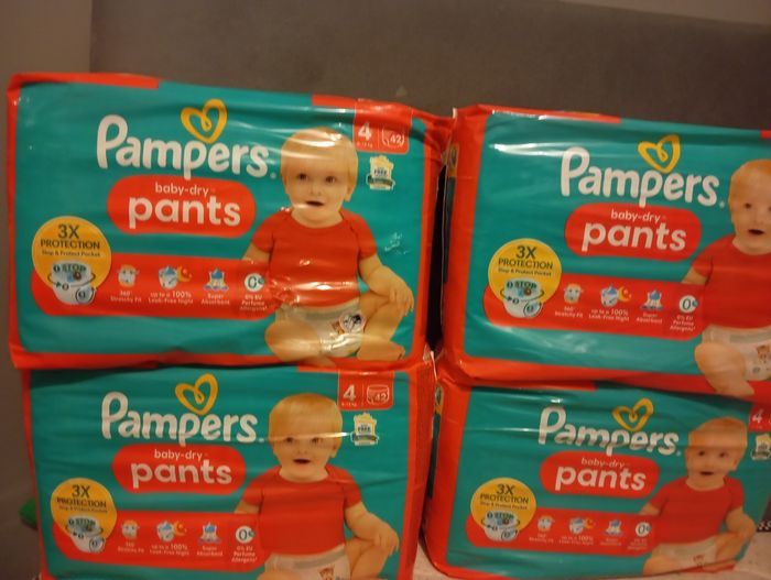 4 paquets taille 4( 168 couches)