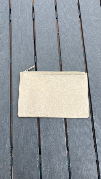 Pochette Lacoste beige à fermeture éclair