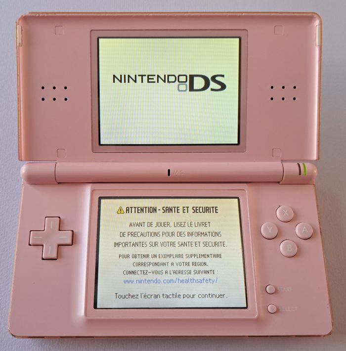 🎮 Console Nintendo DS Lite rose semi fonctionnelle
