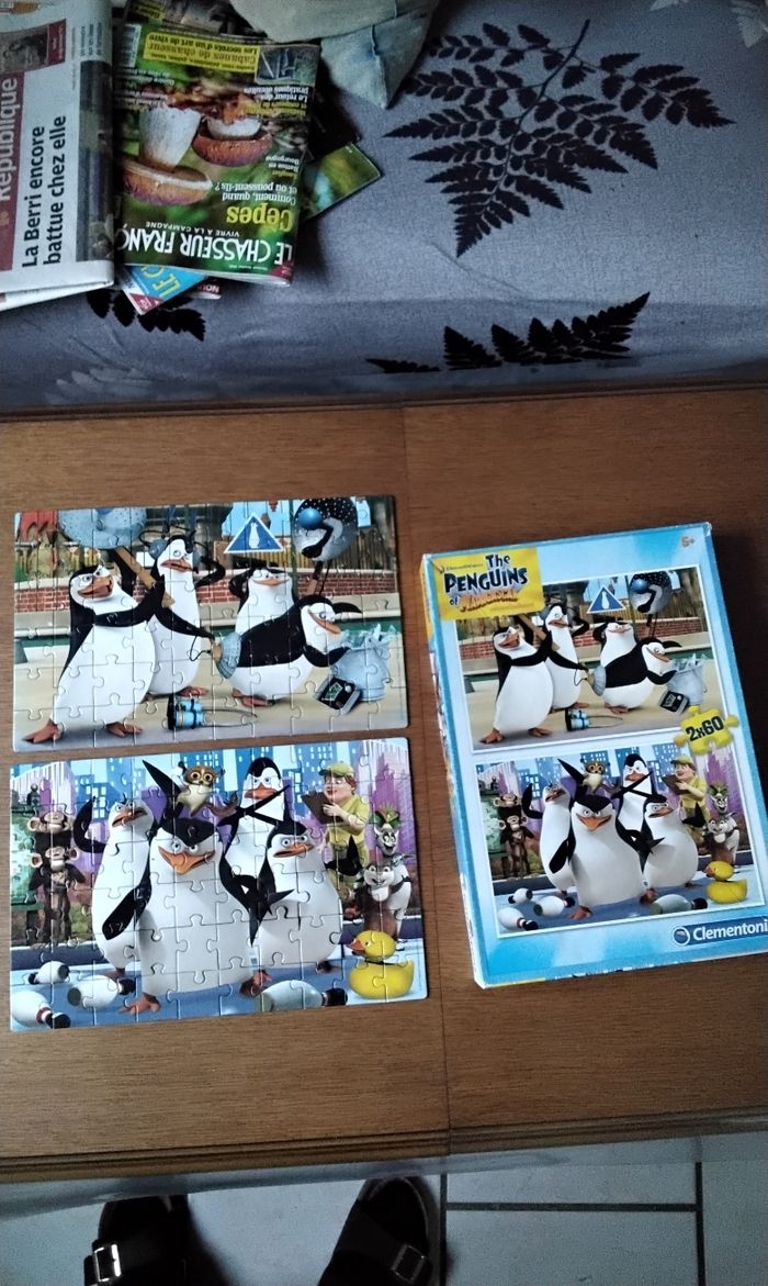 2 puzzles de pingouin de Madagascar ,de 60 pièces chacun ,Clementoni, 5 ans et plus