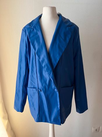 Veste bleue en simili cuir taille XS